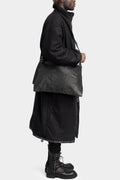 Asymmetrical leather shoulder bag