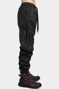 Julius_7 | AW25 - Coated drawstring pants, 917PAM12