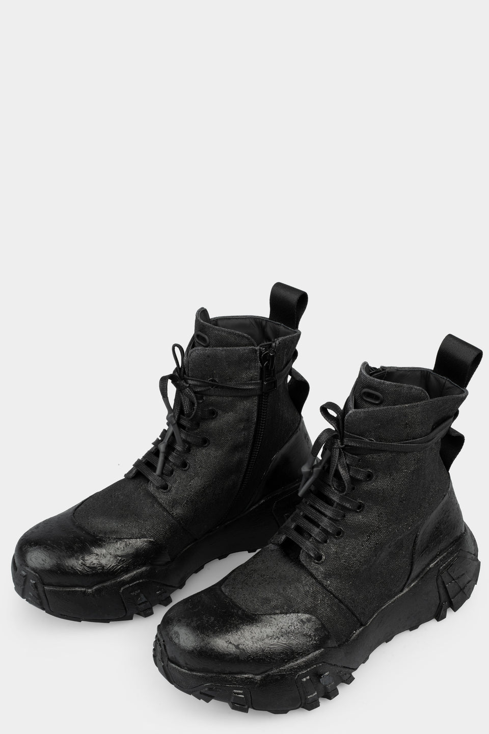 Tar coated canvas boots