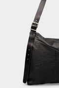 Asymmetrical leather shoulder bag