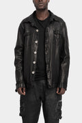 Buttoned up leather over shirt