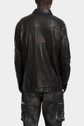 Buttoned up leather over shirt