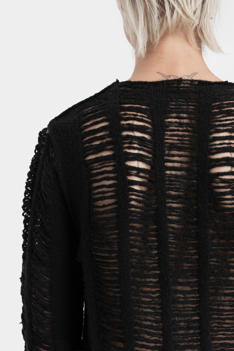 Laddered knit sweater