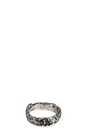 Cuma | Silver band ring with black diamond, shot on table