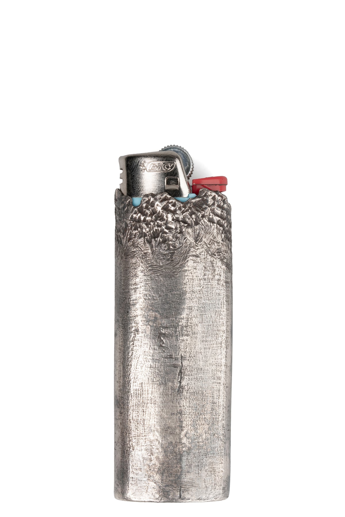 CUMA | Textured silver lighter case, shot on table