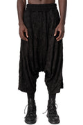 Oversized low-crotch wrinkled jersey trousers