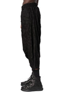 Oversized low-crotch wrinkled jersey trousers