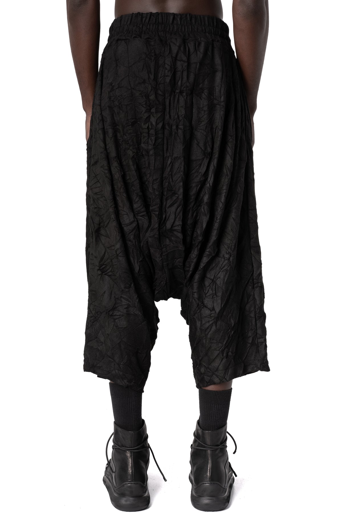 Oversized low-crotch wrinkled jersey trousers