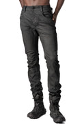 Coated stretch denim trousers