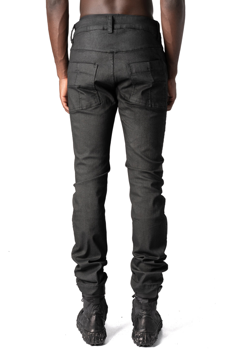 Coated stretch denim trousers