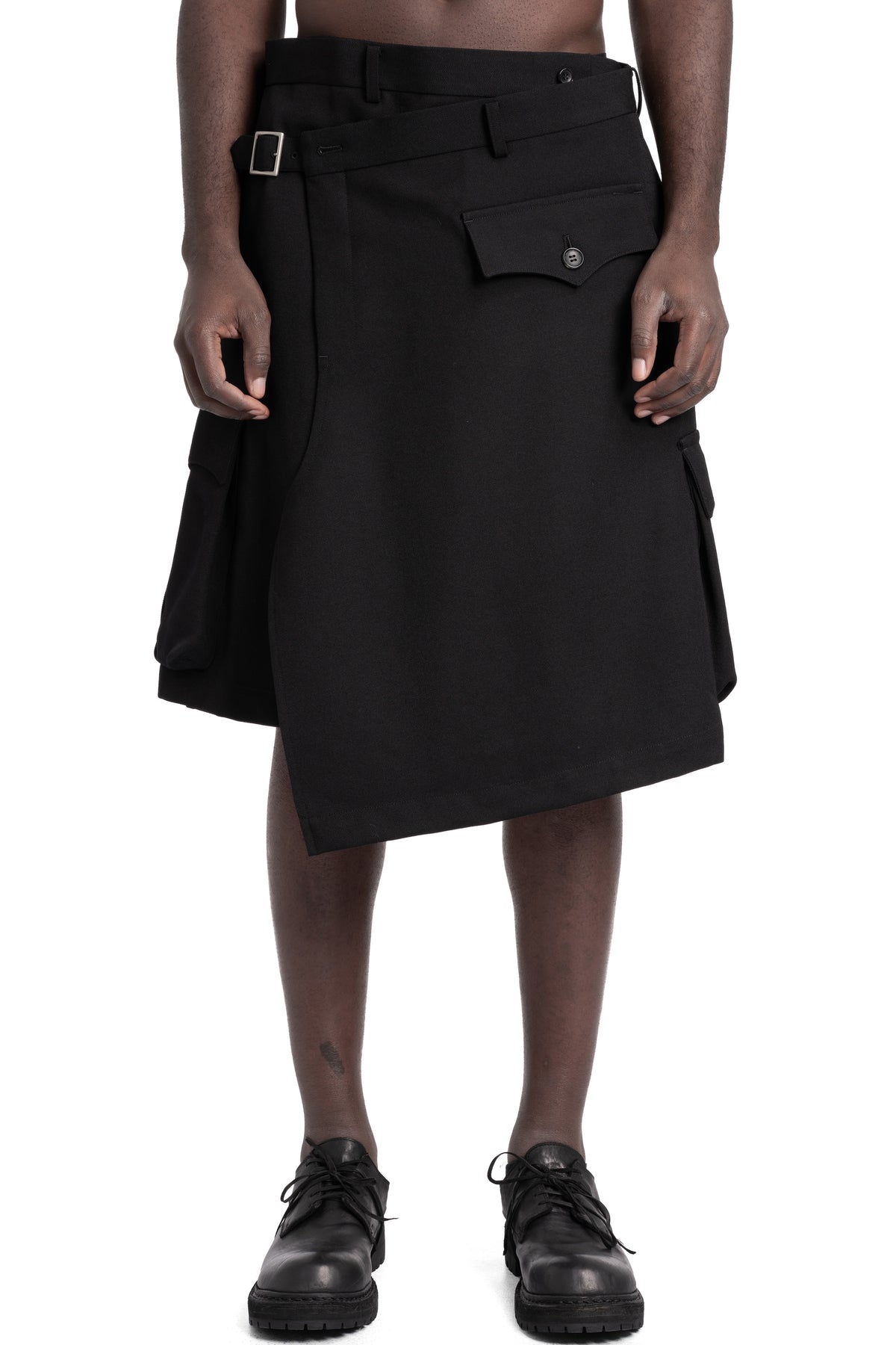 CDG Homme Plus | AW25 - Woven wool asymmetrical skirt, PP-P027, front view on model
