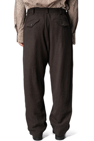 Drop-crotch pleated trousers