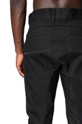 Stretch denim overlock twisted curve trousers, Black