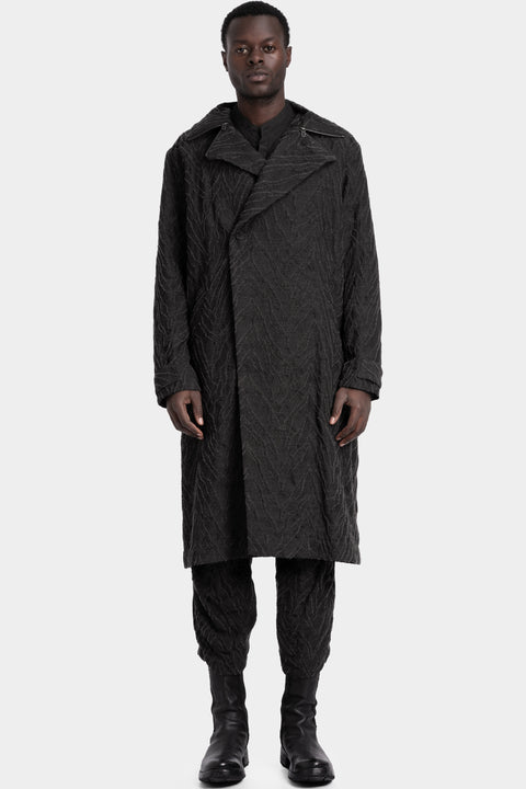 D.Hygen | AW25 -  Deformed Herringbone Jacquard Double-Breasted Coat, front view on model