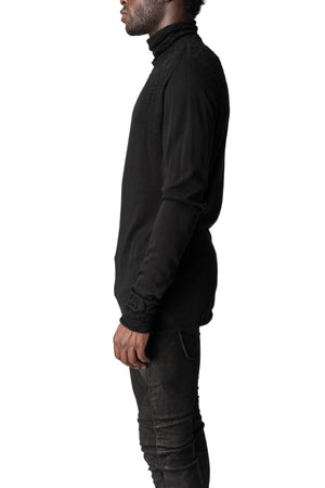 Light wool turtleneck sweater