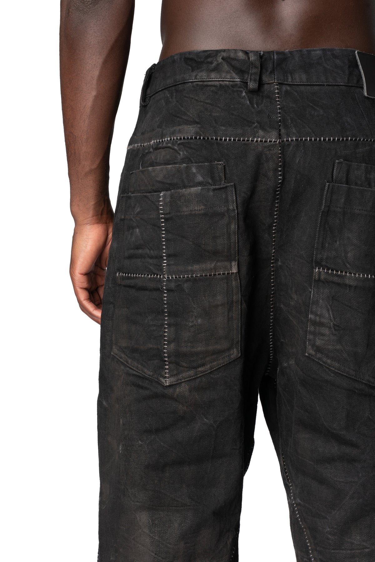 Loose fit treated denim jeans