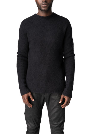 Heavy wool sweater with cross embroidery