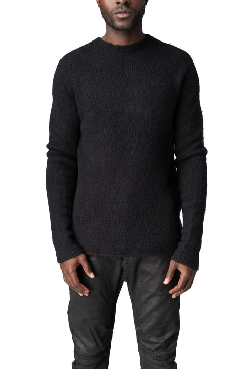 Heavy wool sweater with cross embroidery