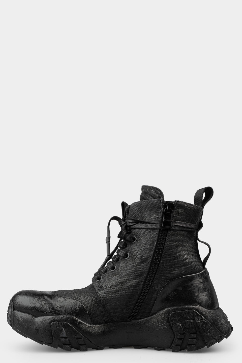 Tar coated canvas boots
